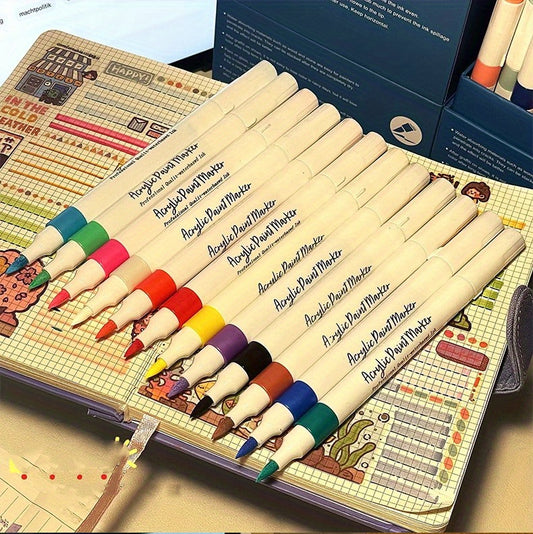Budget-Friendly Colourful Acrylic Marker Brush Tip Set of acrylic paint markers on a colourful notebook