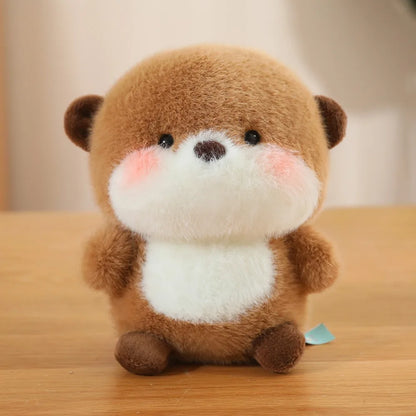 Super Cute Small Plush Toy Brown with white belly otter on a wooden surface with a blurred background