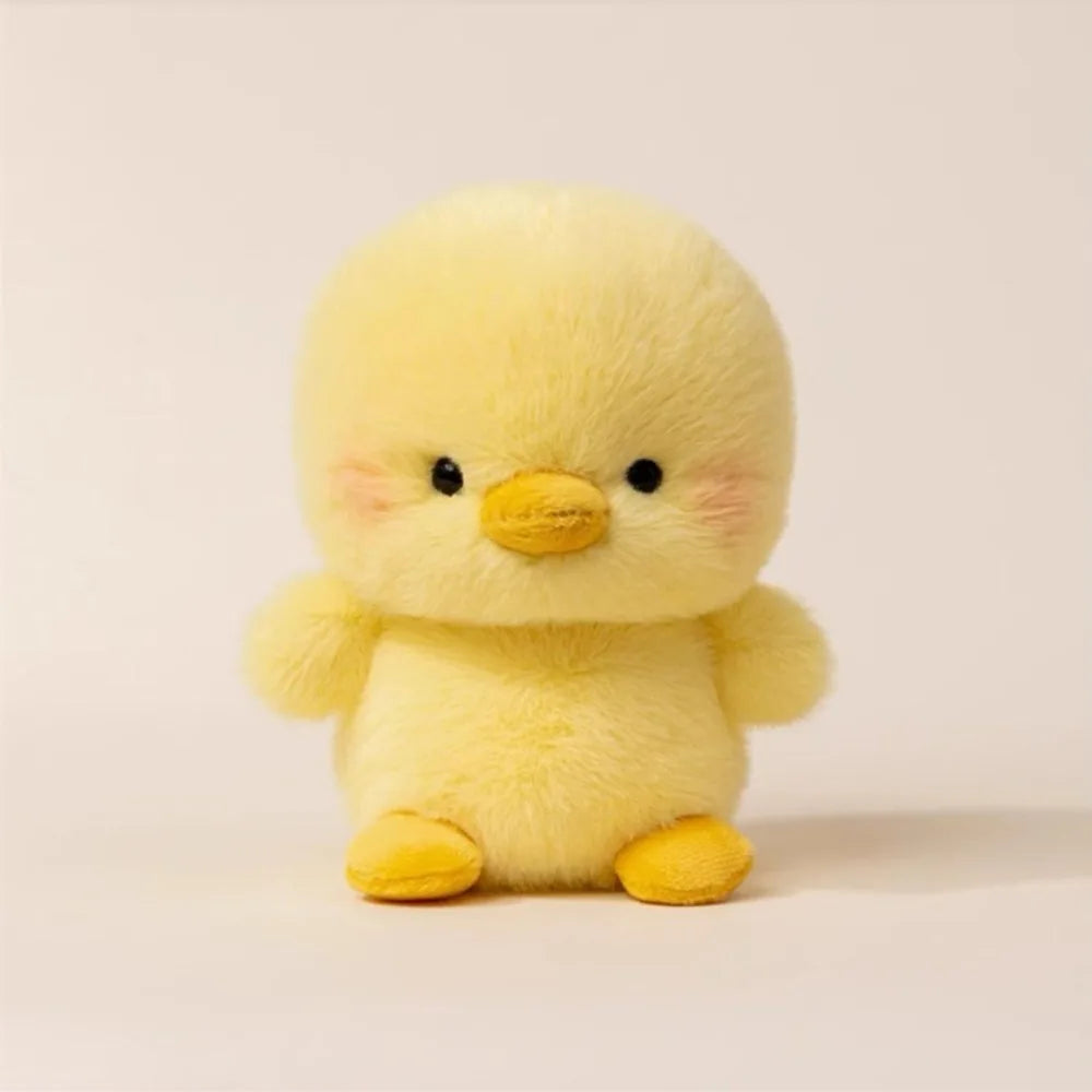 Cute little Chick Yellow plush  toy on a beige background